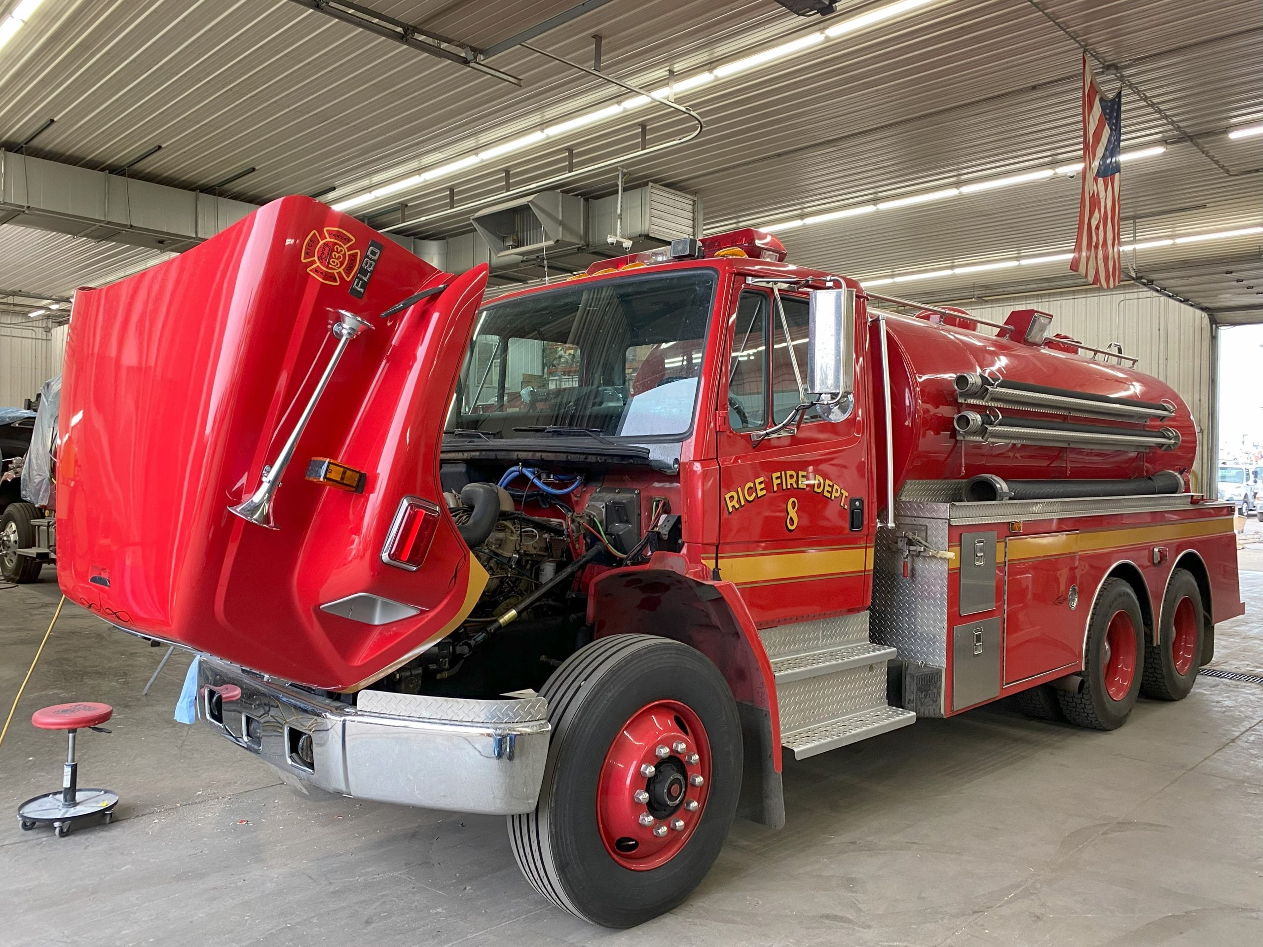 Two fire trucks in service facility