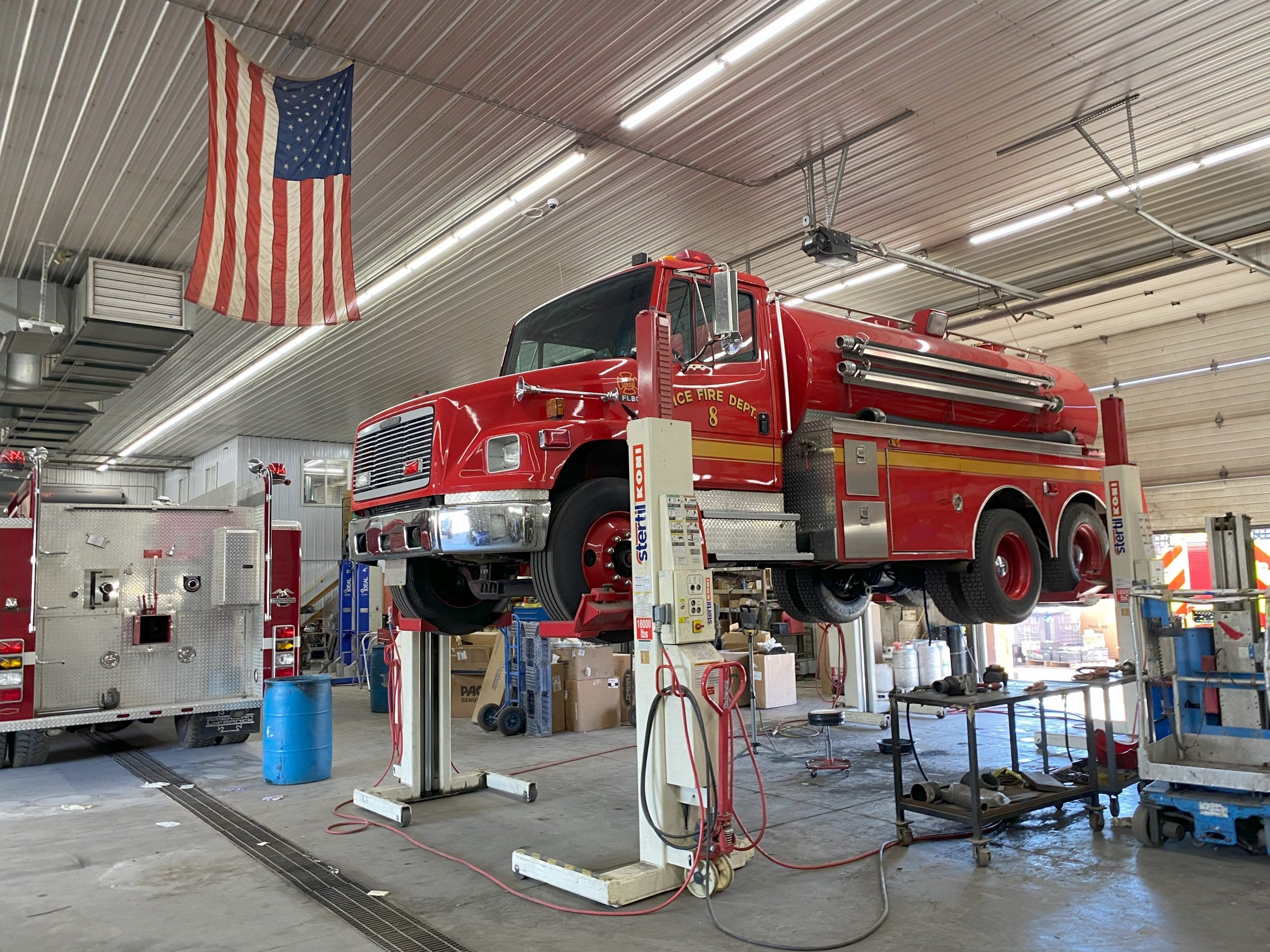 Fire truck elevated on lift